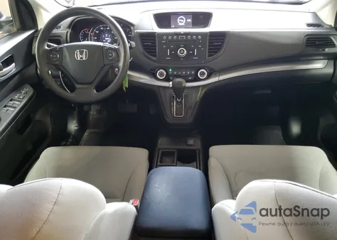 2015 Honda Cr-V Lx z USA, uszkodzony, nr VIN 2HKRM4H30FH617573